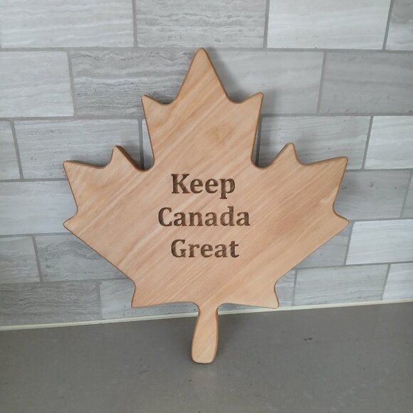 Charcuterie/Cutting Board in the shape of a maple leaf with "Keep Canada Great" - Picture 1 of 7